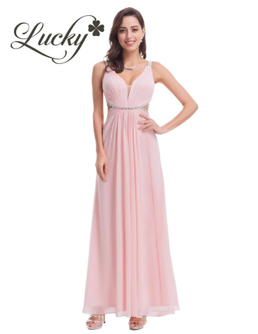 Vestido rosa con brillantes en cintura y espalda abierta