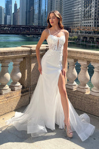 Vestido blanco con piedras y transparencias