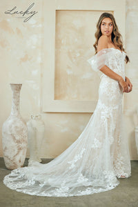 Vestido blanco con encaje y cola