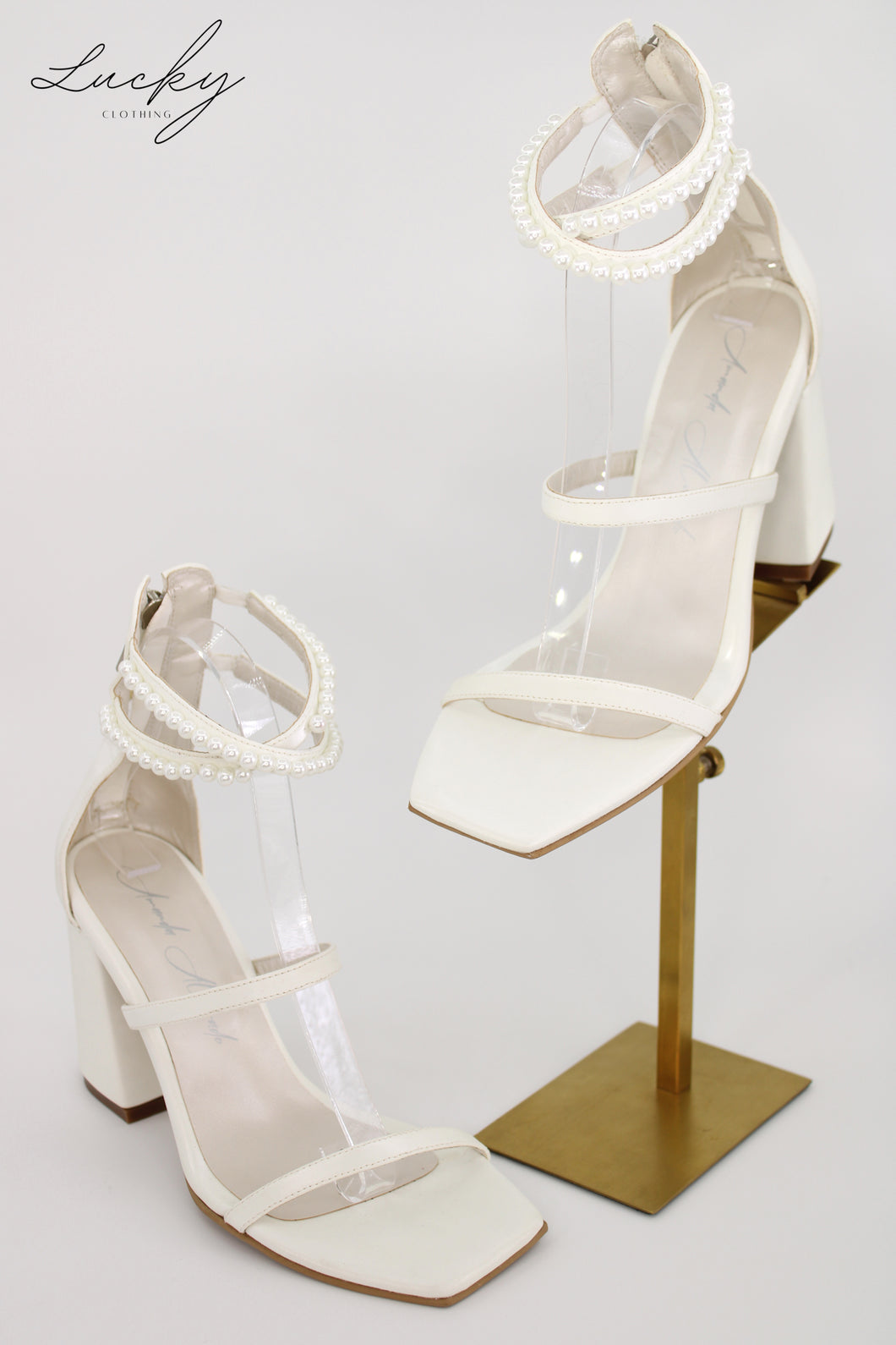 Sandalia venecia blanca alta con perlas