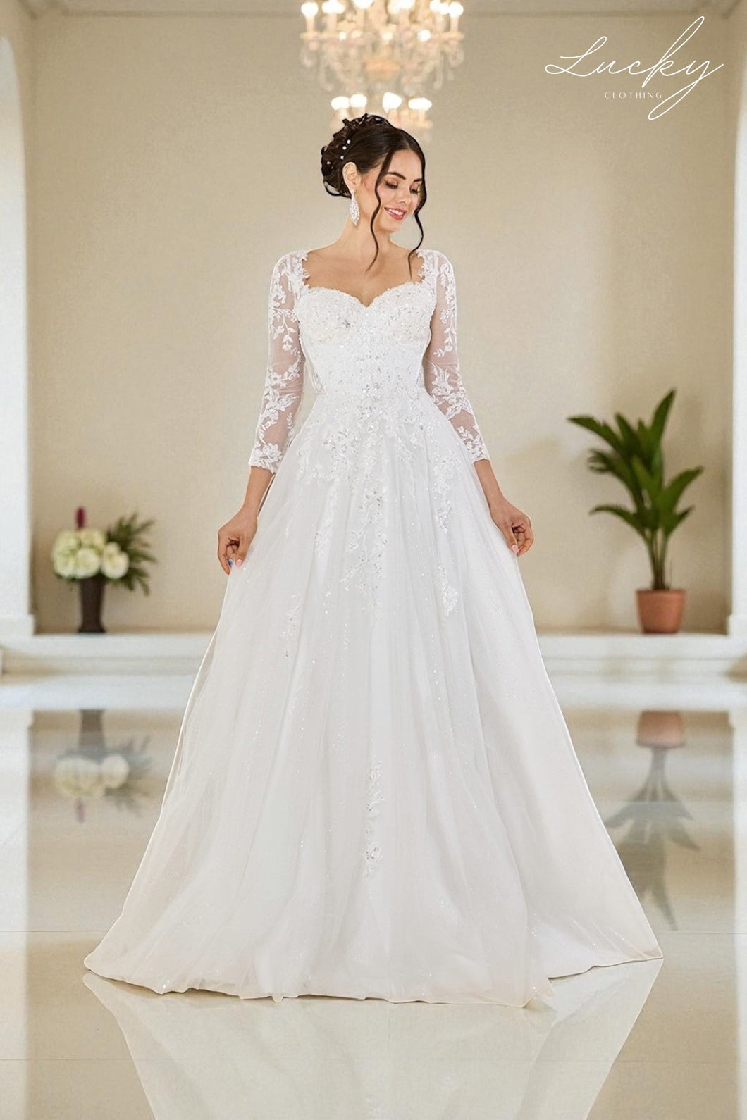 Vestido blanco con mangas encaje y piedras