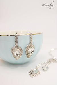 Set de collar y arete plateado