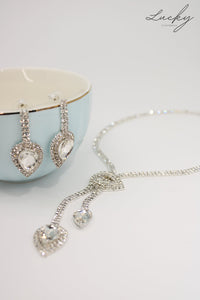 Set de collar y arete plateado