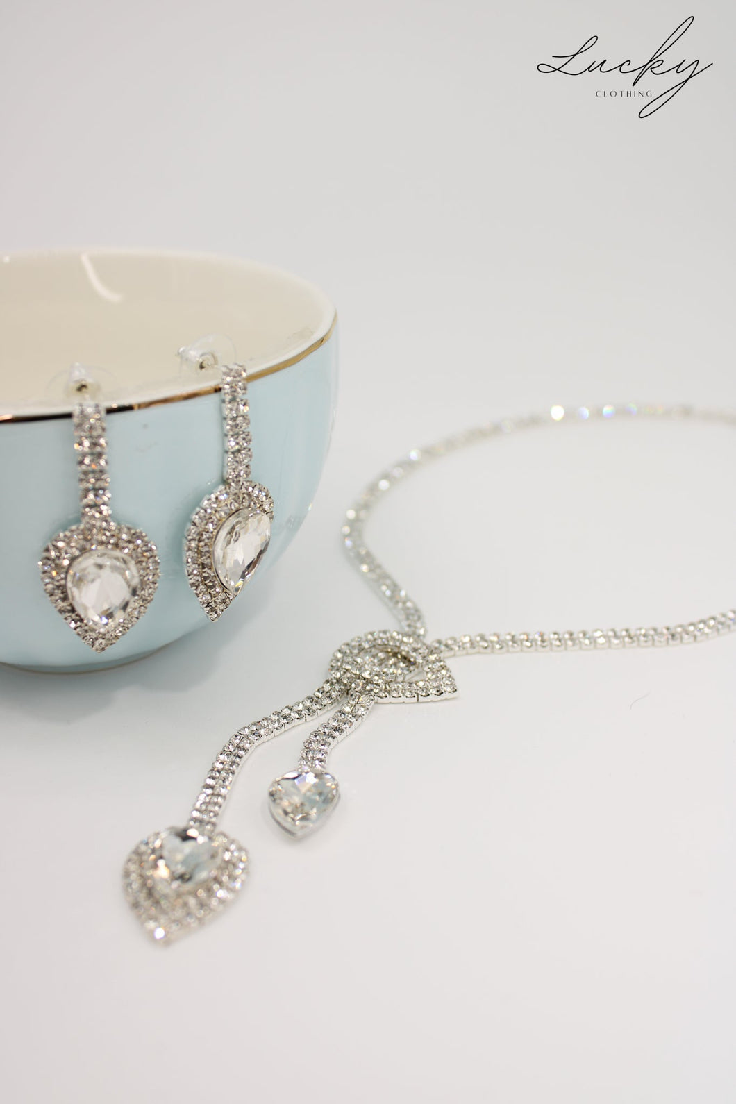 Set de collar y arete plateado