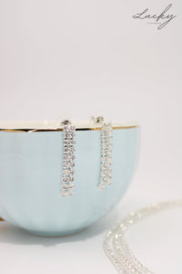 Set de collar y arete plateado