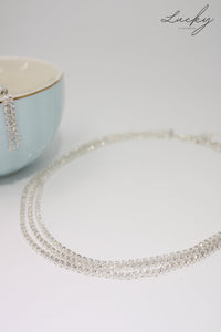 Set de collar y arete plateado