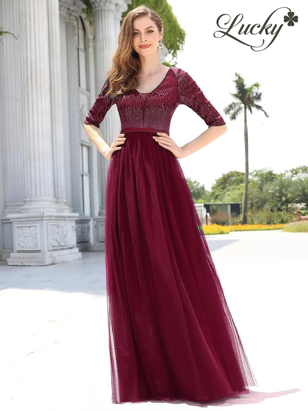 Vestido vino con lentejuelas y mangas