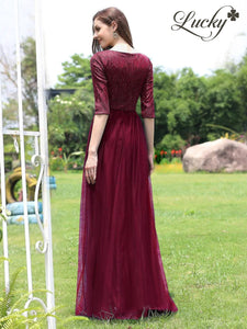 Vestido vino con lentejuelas y mangas
