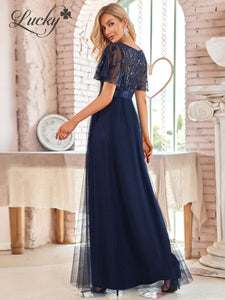 Vestido azul navy con detalles de hojas y mangas