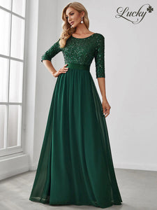 Vestido verde con mangas y lentejuelas