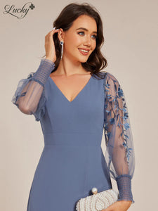 Vestido dusty blue con mangas