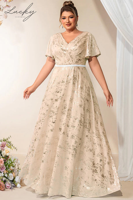 Vestido champagne con detalles plata
