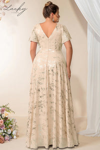 Vestido champagne con detalles plata