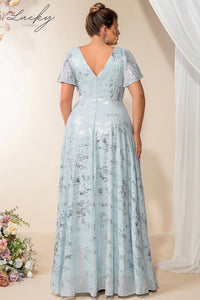 Vestido celeste con detalles plata