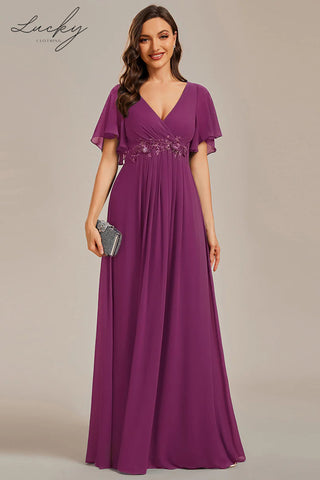 Vestido fucsia con manga corta