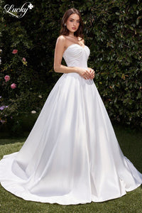 Vestido blanco strapless volado de satin