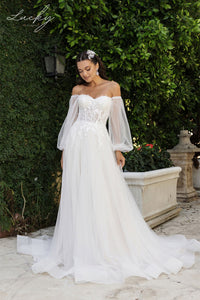 Vestido blanco con mangas desmontables