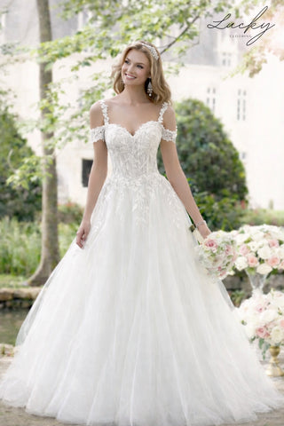 Vestido blanco con encaje y manga caida