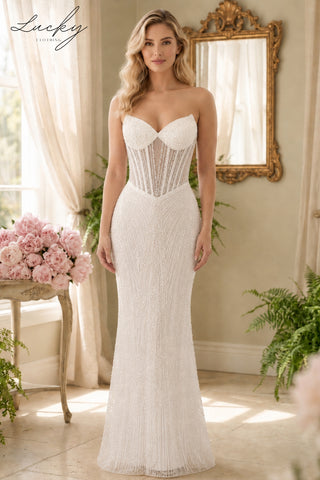 Vestido blanco al cuerpo con piedras