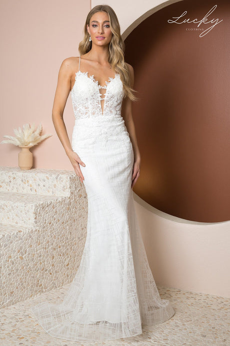 Vestido blanco al cuerpo con brillos