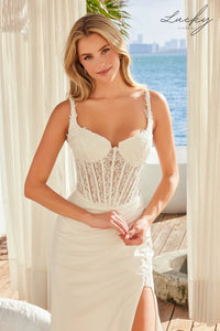 Vestido blanco al cuerpo con encaje