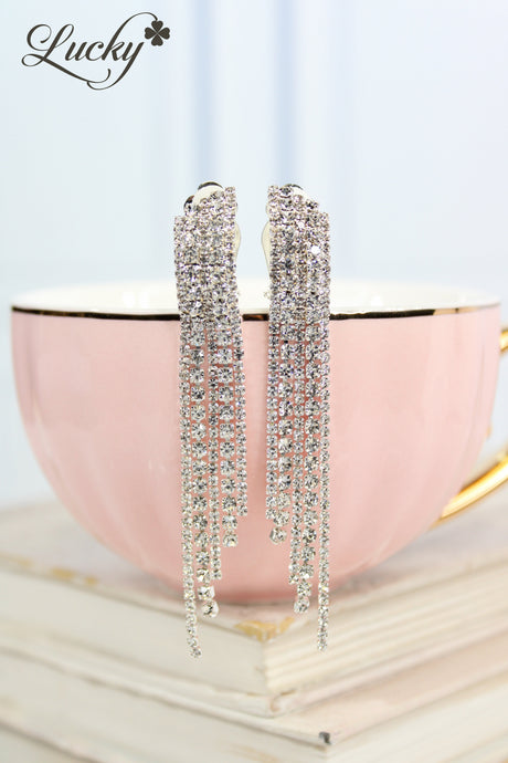 Arete plateado de clip grande