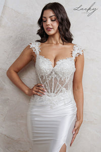 Vestido blanco al cuerpo con encaje