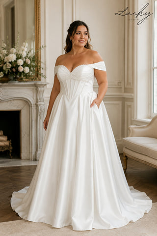 Vestido blanco plus con perlas y manga