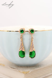 Arete dorado y verde
