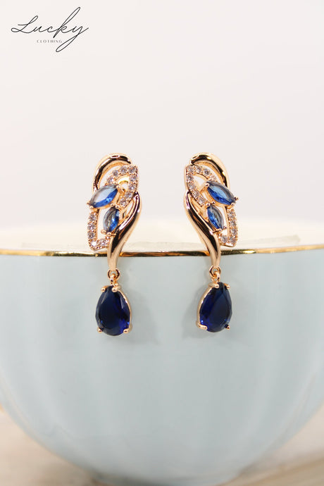 Arete dorado y azul