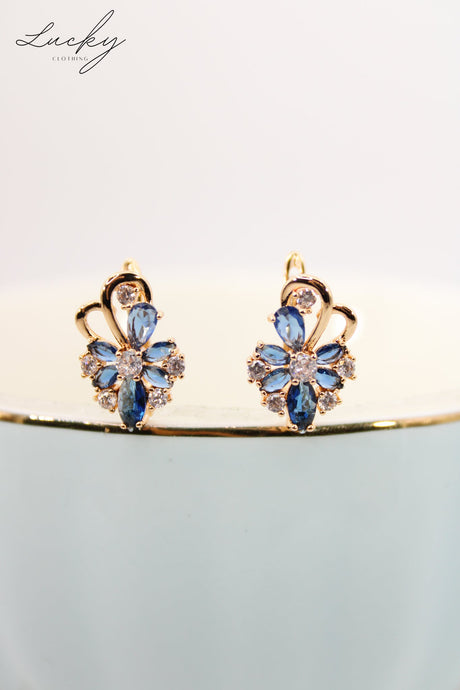 Arete dorado y azul