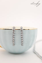 Cargar imagen en el visor de la galería, Set plateado de aretes, collar y brazalete