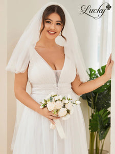 Vestido blanco de tul con detalle en cintura