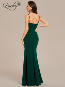 Vestido verde al cuerpo con brillos